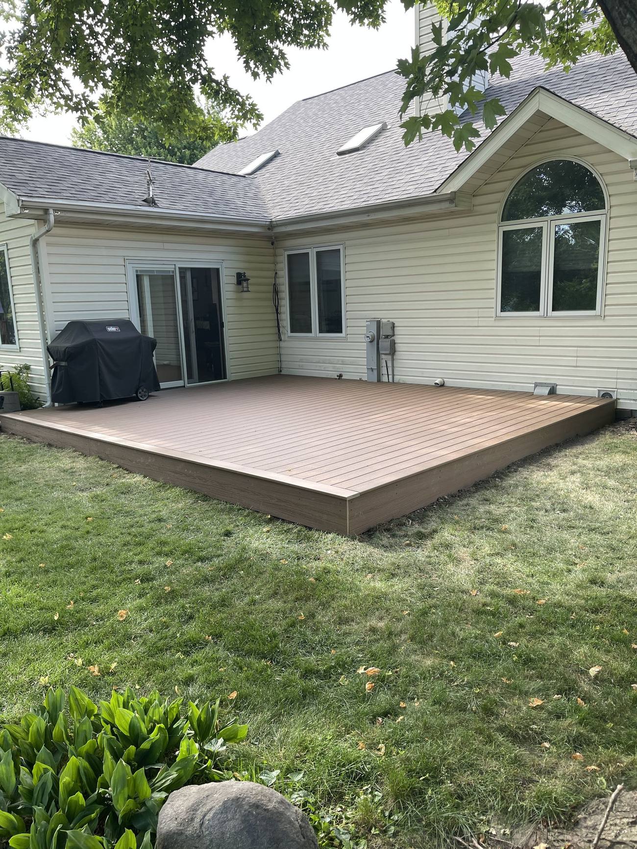 New ground-level composite deck built by Ask Adam, Madison WI contractor